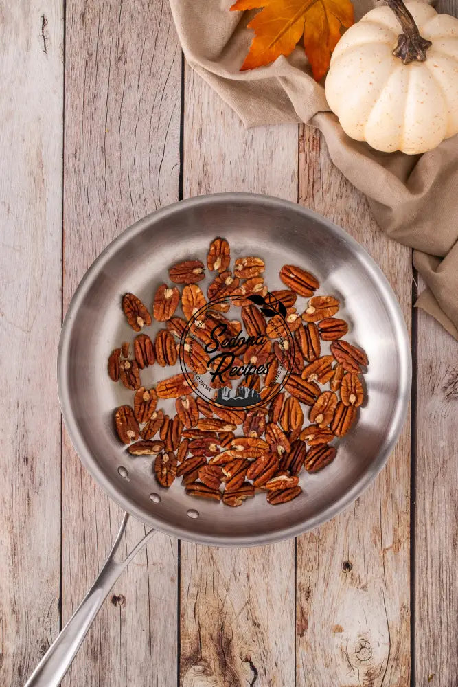Pumpkin Cake with Maple Frosting & Toasted Pecans