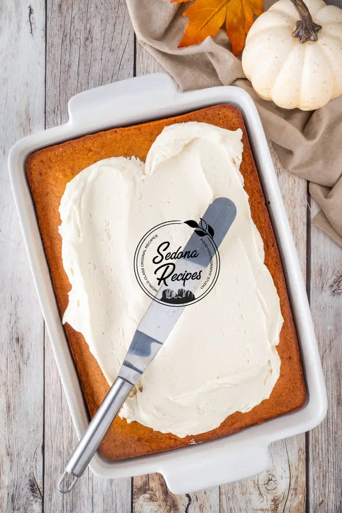 Pumpkin Cake with Maple Frosting & Toasted Pecans